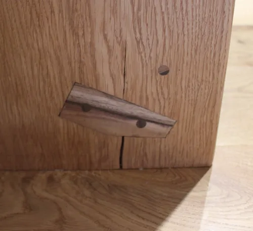 Firāq — walnut butterfly in a crack