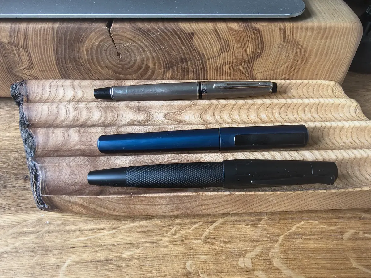 Skidbladnir — a pen tray carved from solid ash, four channels, live edge